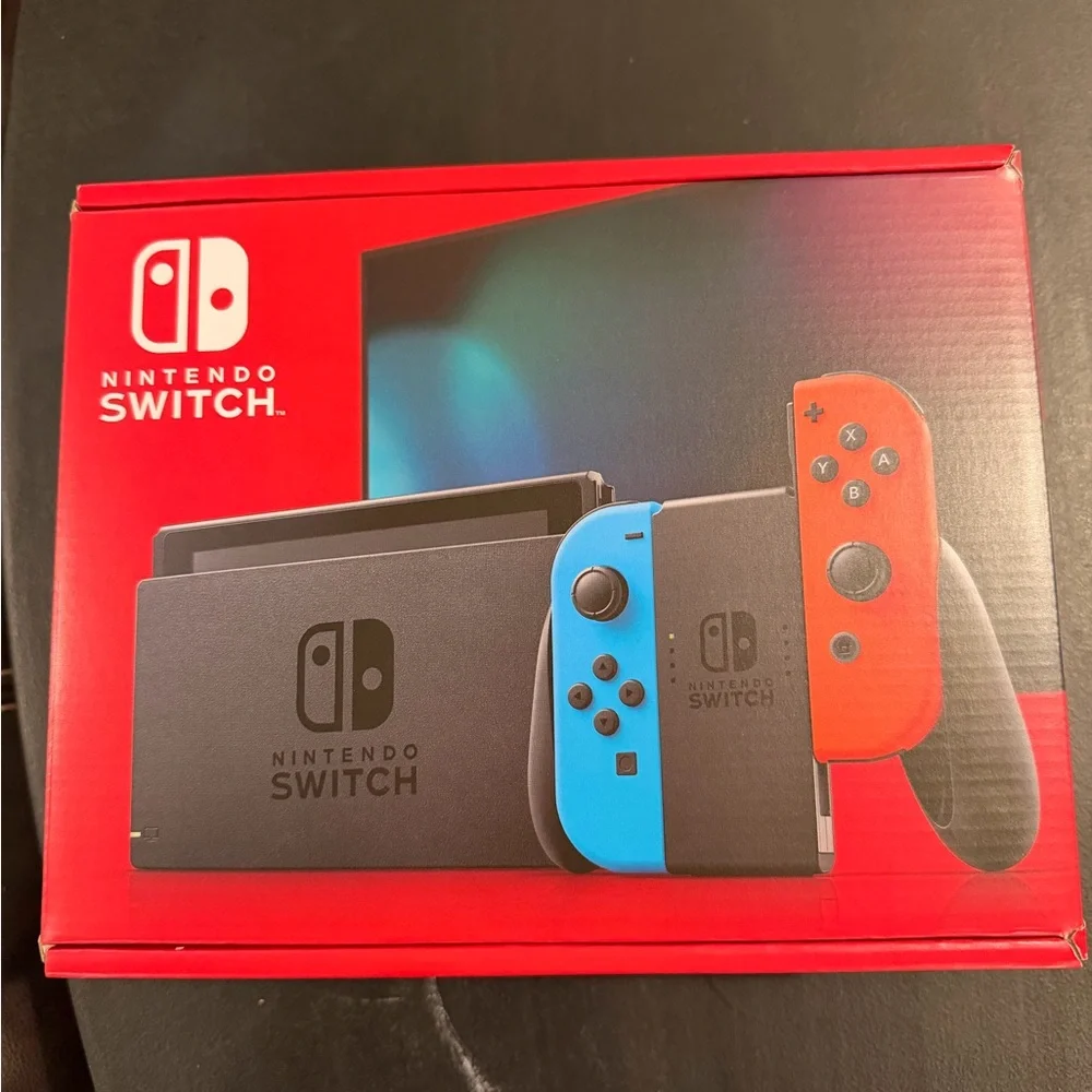 Nintendo Switch Console with Red and Blue Joy-Con (Brand new, never opened.)